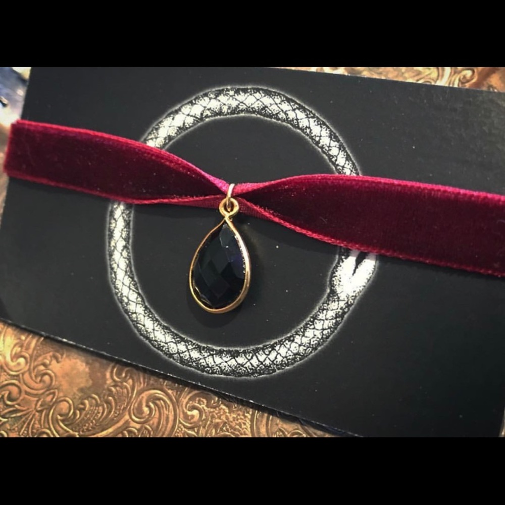 Onyx choker on red velvet